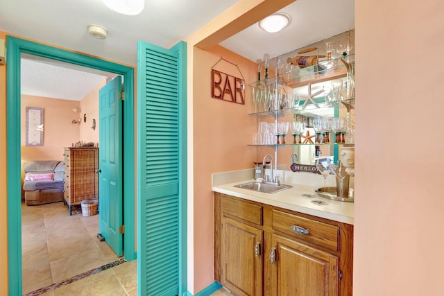 2400 S Ocean Dr Unit 4223, Fort Pierce, FL 34949 - indoor wet bar featuring light tile patterned floors
