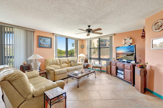 2400 S Ocean Dr Unit 4223, Fort Pierce, FL 34949 - living area with ceiling fan, healthy amount of natural light, a textured ceiling, and light tile patterned floors