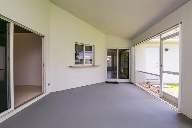 2062 SW Scorpio Ln, Port Saint Lucie, FL 34984 - unfurnished sunroom featuring vaulted ceiling and healthy amount of natural light