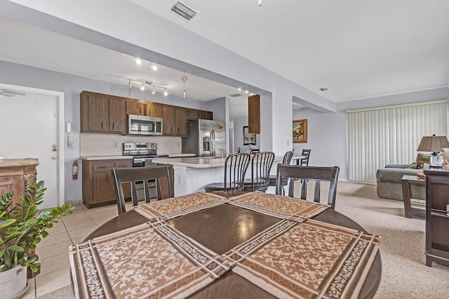 1261 NW 44th St, Deerfield Beach, FL 33064 - dining space with light tile patterned floors