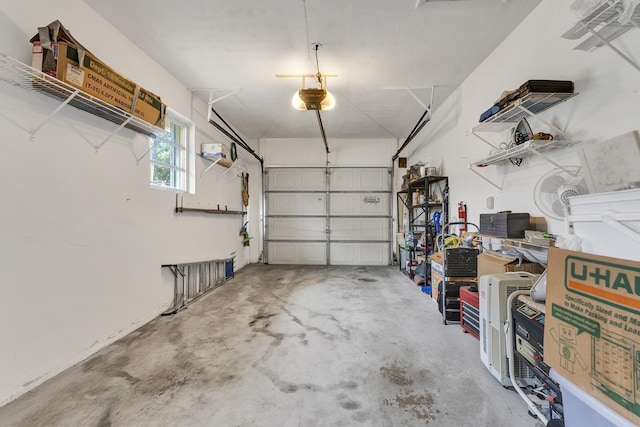 1261 NW 44th St, Deerfield Beach, FL 33064 - garage featuring a garage door opener