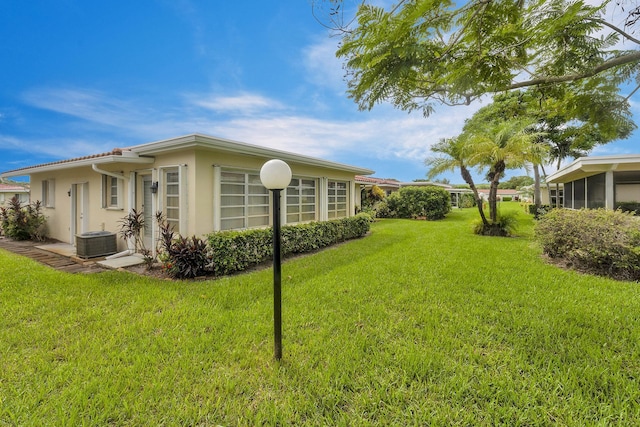 1261 NW 44th St, Deerfield Beach, FL 33064 - view of green lawn