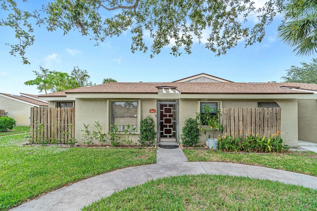 241 Meadows Dr Unit 241, Boynton Beach, FL 33436 - view of front of property with stucco siding and a shingled roof