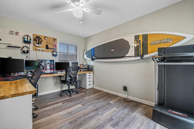 241 Meadows Dr Unit 241, Boynton Beach, FL 33436 - home office with wood finished floors, ceiling fan, and a textured ceiling