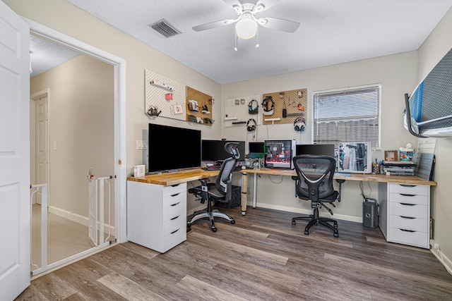 241 Meadows Dr Unit 241, Boynton Beach, FL 33436 - office space with wood finished floors, a ceiling fan, and a textured ceiling