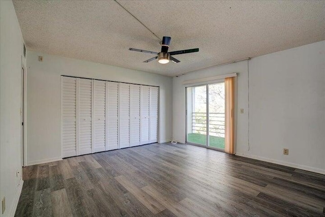 4110 Newport U Unit 4110, Deerfield Beach, FL 33442 - unfurnished bedroom with wood finished floors, a textured ceiling, access to exterior, and ceiling fan