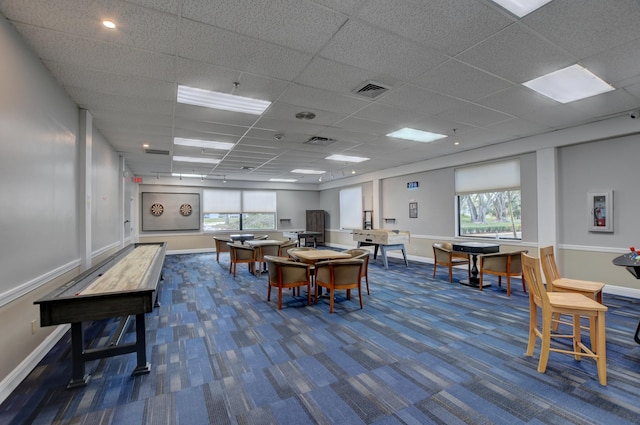 4110 Newport U Unit 4110, Deerfield Beach, FL 33442 - recreation room featuring dark colored carpet and a drop ceiling