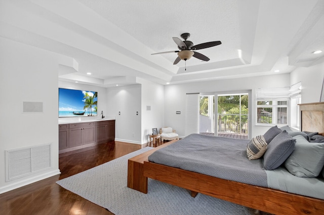 4315 Caryota Dr, Boynton Beach, FL 33436 - bedroom featuring a tray ceiling, dark wood finished floors, recessed lighting, and ceiling fan