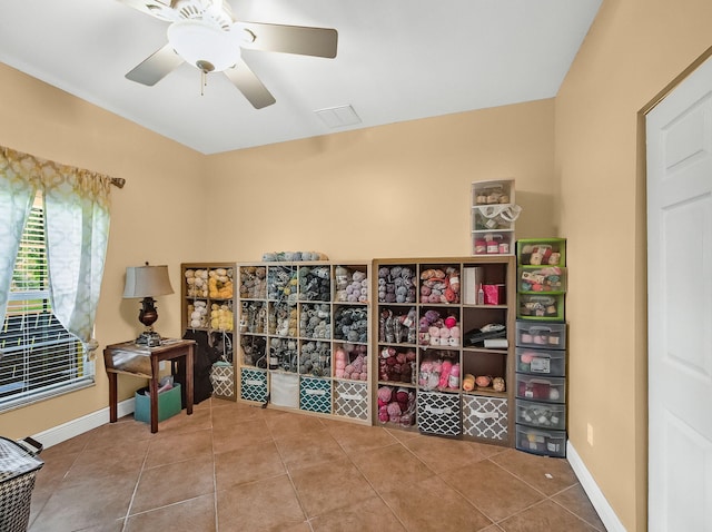 5301 Bald Cypress Trl, Fort Pierce, FL 34951 - living area with tile patterned flooring and ceiling fan