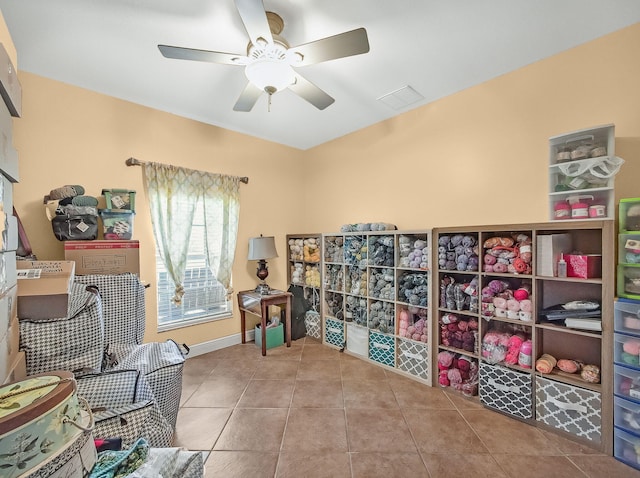 5301 Bald Cypress Trl, Fort Pierce, FL 34951 - sitting room with ceiling fan and tile patterned floors