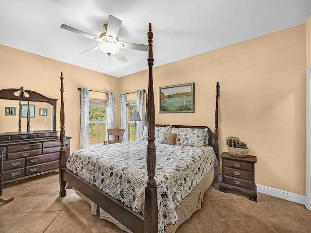 5301 Bald Cypress Trl, Fort Pierce, FL 34951 - bedroom with tile patterned floors and a ceiling fan
