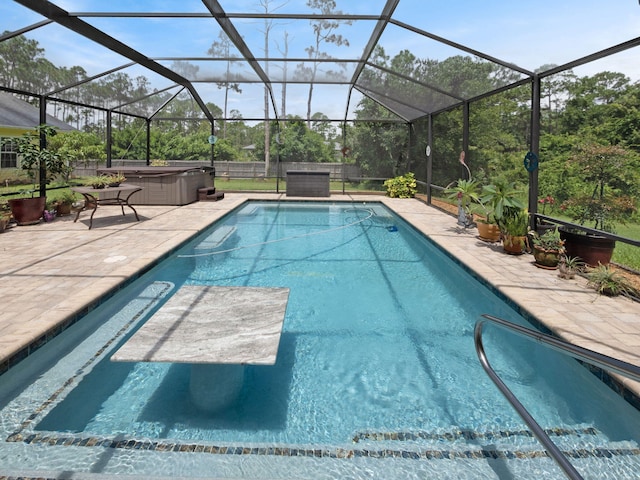 5301 Bald Cypress Trl, Fort Pierce, FL 34951 - swimming pool with a hot tub, a patio area, a fenced backyard, and a lanai