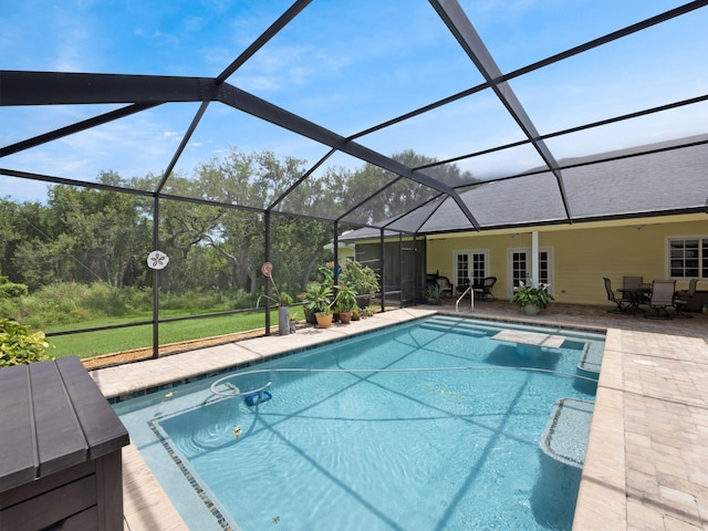 5301 Bald Cypress Trl, Fort Pierce, FL 34951 - outdoor pool featuring a patio area, a lanai, and outdoor dining area