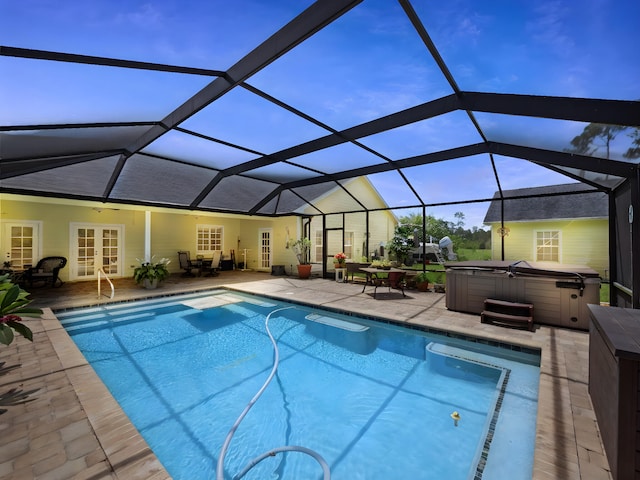 5301 Bald Cypress Trl, Fort Pierce, FL 34951 - swimming pool featuring a hot tub, french doors, a patio, and glass enclosure