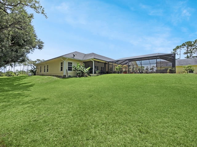 5301 Bald Cypress Trl, Fort Pierce, FL 34951 - view of grassy yard with glass enclosure