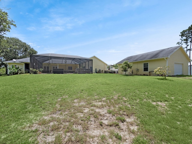 5301 Bald Cypress Trl, Fort Pierce, FL 34951 - view of grassy yard with a lanai