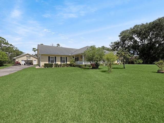 5301 Bald Cypress Trl, Fort Pierce, FL 34951 - single story home featuring a front lawn, driveway, and a garage