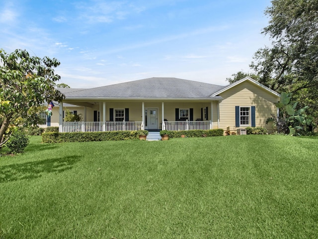 5301 Bald Cypress Trl, Fort Pierce, FL 34951 - view of front of property with covered porch and a front yard