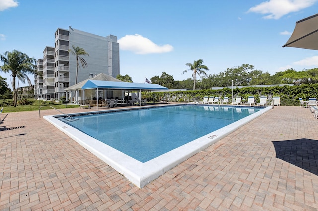 5500 NW 2nd Ave Unit 718, Boca Raton, FL 33487 - community pool featuring a patio area