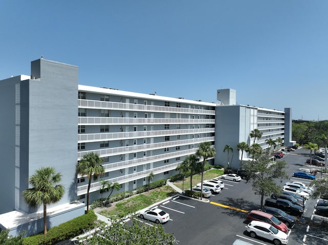 5500 NW 2nd Ave Unit 718, Boca Raton, FL 33487 - view of apartment building / complex featuring uncovered parking