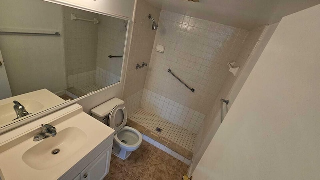 206 Foxtail Dr Unit D1, Greenacres, FL 33415 - bathroom featuring tiled shower, vanity, and tile patterned floors