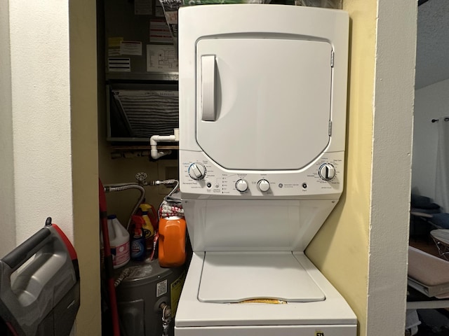 751 Cypress Ln Unit K, Deerfield Beach, FL 33064 - washroom featuring stacked washer / drying machine
