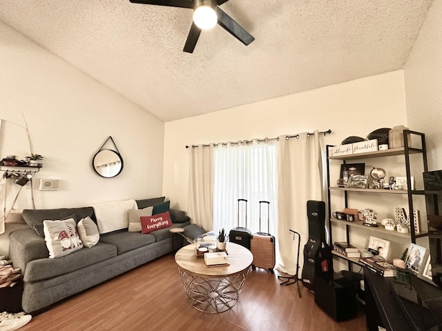 751 Cypress Ln Unit K, Deerfield Beach, FL 33064 - living area with a textured ceiling, wood finished floors, lofted ceiling, and a ceiling fan