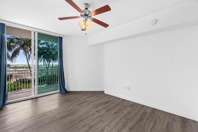 350 N Federal Hwy Unit 609, Boynton Beach, FL 33435 - spare room with a smoke detector, wood finished floors, floor to ceiling windows, and ceiling fan