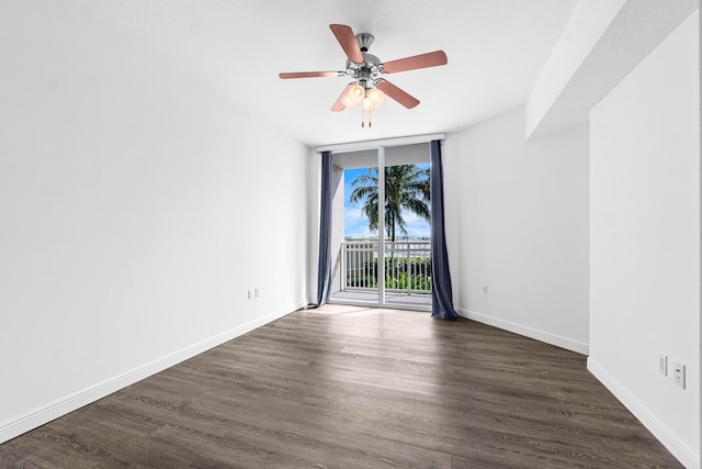 350 N Federal Hwy Unit 609, Boynton Beach, FL 33435 - spare room featuring expansive windows, dark wood-style floors, and a ceiling fan