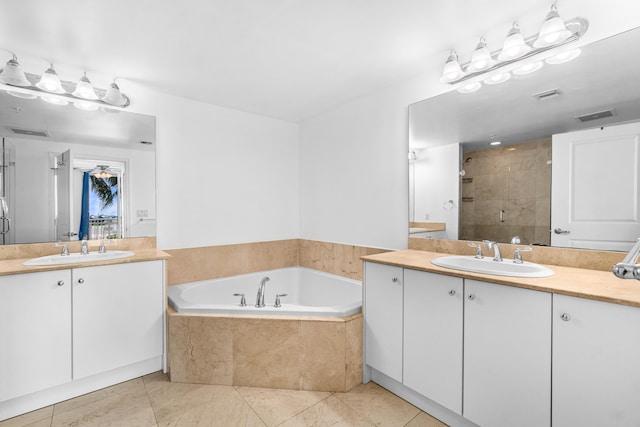 350 N Federal Hwy Unit 609, Boynton Beach, FL 33435 - full bath featuring two vanities, a bath, a stall shower, and tile patterned flooring