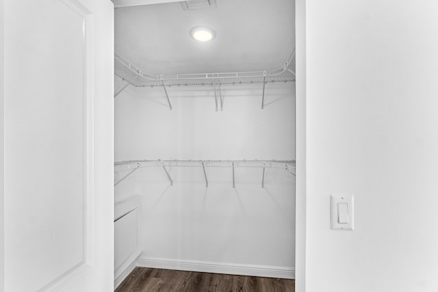 350 N Federal Hwy Unit 609, Boynton Beach, FL 33435 - spacious closet featuring dark wood-type flooring