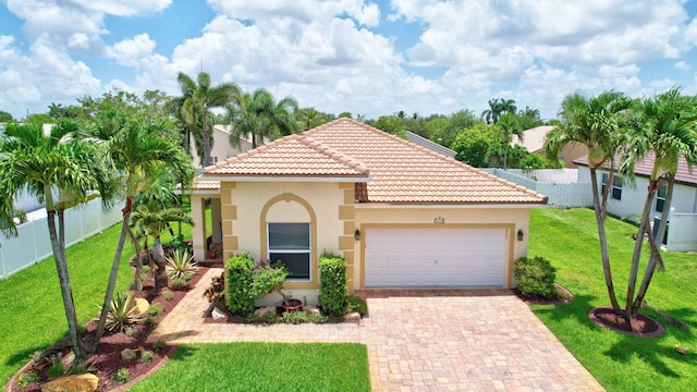 16174 SW 9th St, Pembroke Pines, FL 33027 - mediterranean / spanish house with a garage, stucco siding, decorative driveway, and a tiled roof