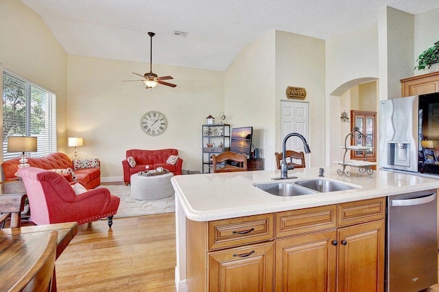 16174 SW 9th St, Pembroke Pines, FL 33027 - kitchen featuring open floor plan, dishwasher, light wood finished floors, light countertops, and a kitchen island with sink