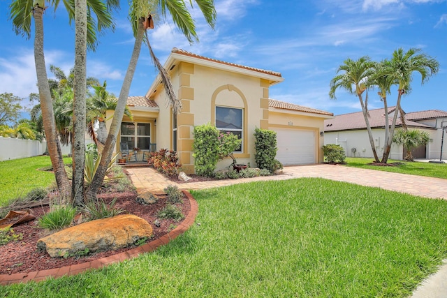 16174 SW 9th St, Pembroke Pines, FL 33027 - mediterranean / spanish house with a tiled roof, decorative driveway, stucco siding, and a garage