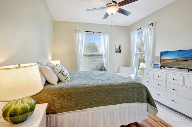 16174 SW 9th St, Pembroke Pines, FL 33027 - bedroom featuring wood finished floors and a ceiling fan