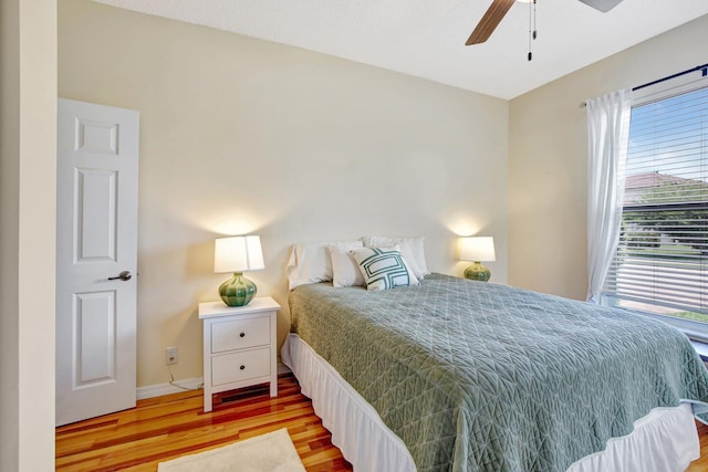 16174 SW 9th St, Pembroke Pines, FL 33027 - bedroom featuring wood finished floors and a ceiling fan