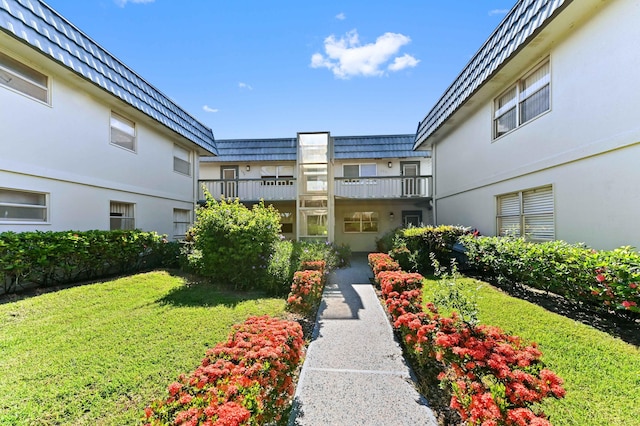154 Tuscany C, Delray Beach, FL 33446 - view of community with a lawn