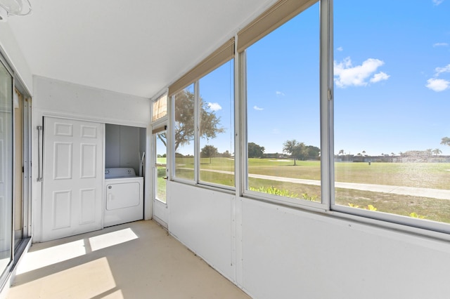 154 Tuscany C, Delray Beach, FL 33446 - unfurnished sunroom featuring washer / dryer