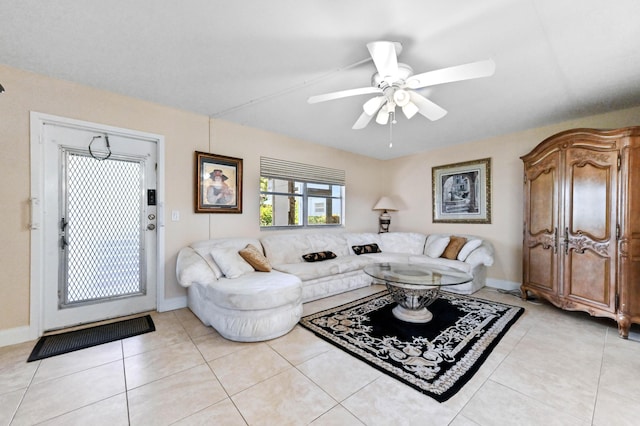 154 Tuscany C, Delray Beach, FL 33446 - living room featuring a ceiling fan and light tile patterned flooring