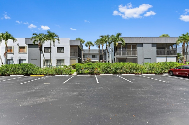 15054 Ashland Way Unit 84, Delray Beach, FL 33484 - view of building exterior with uncovered parking