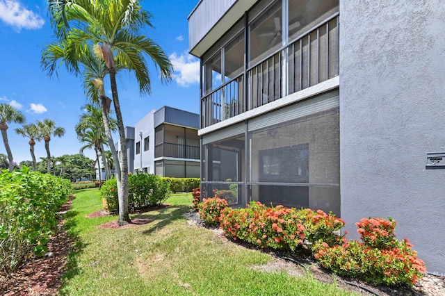 15054 Ashland Way Unit 84, Delray Beach, FL 33484 - view of grassy yard with a sunroom