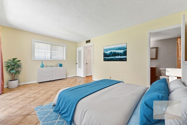 15054 Ashland Way Unit 84, Delray Beach, FL 33484 - bedroom with light tile patterned floors and baseboards