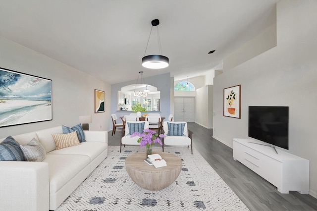 7937 Sonora St, Boynton Beach, FL 33437 - living area featuring wood finished floors and a chandelier