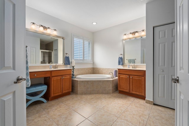 709 SW Sun Cir, Palm City, FL 34990 - full bath with a bath, two vanities, tile patterned floors, a shower stall, and a closet