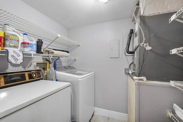 512 Shady Pine Way Unit B1, Greenacres, FL 33415 - washroom featuring washing machine and clothes dryer and electric panel