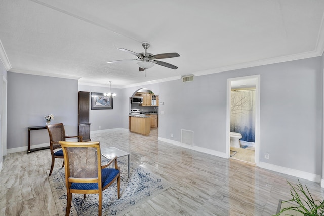 512 Shady Pine Way Unit B1, Greenacres, FL 33415 - living area featuring a ceiling fan, crown molding, arched walkways, and a chandelier