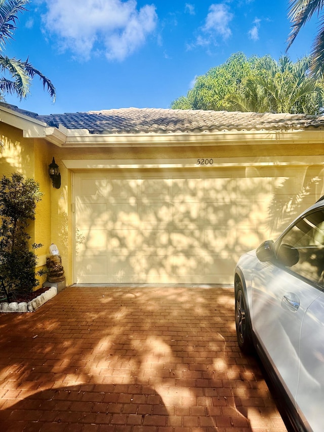 5200 Rising Comet Ln, Greenacres, FL 33463 - garage with driveway