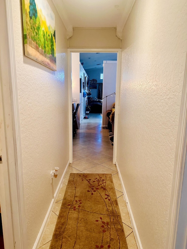 5200 Rising Comet Ln, Greenacres, FL 33463 - hall with a textured wall, light tile patterned flooring, and crown molding