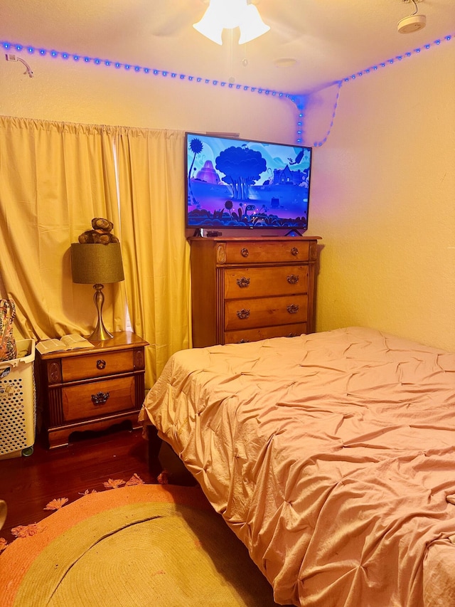 5200 Rising Comet Ln, Greenacres, FL 33463 - bedroom with wood finished floors and ceiling fan