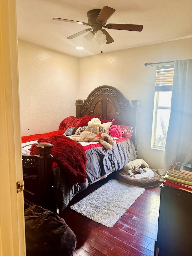 5200 Rising Comet Ln, Greenacres, FL 33463 - bedroom with hardwood / wood-style floors and ceiling fan